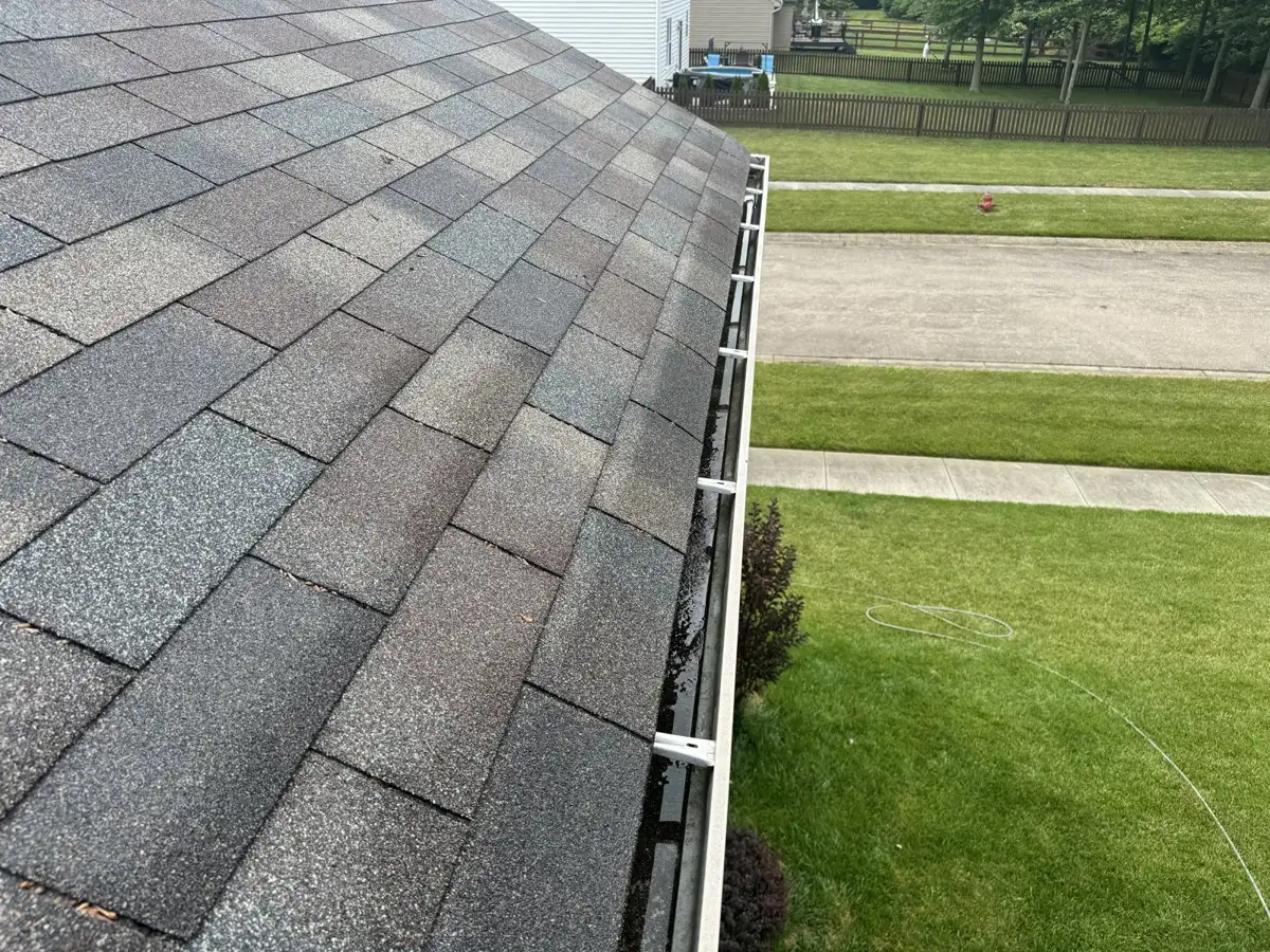 Clean, fully cleared residential gutter after professional cleaning by Skyline