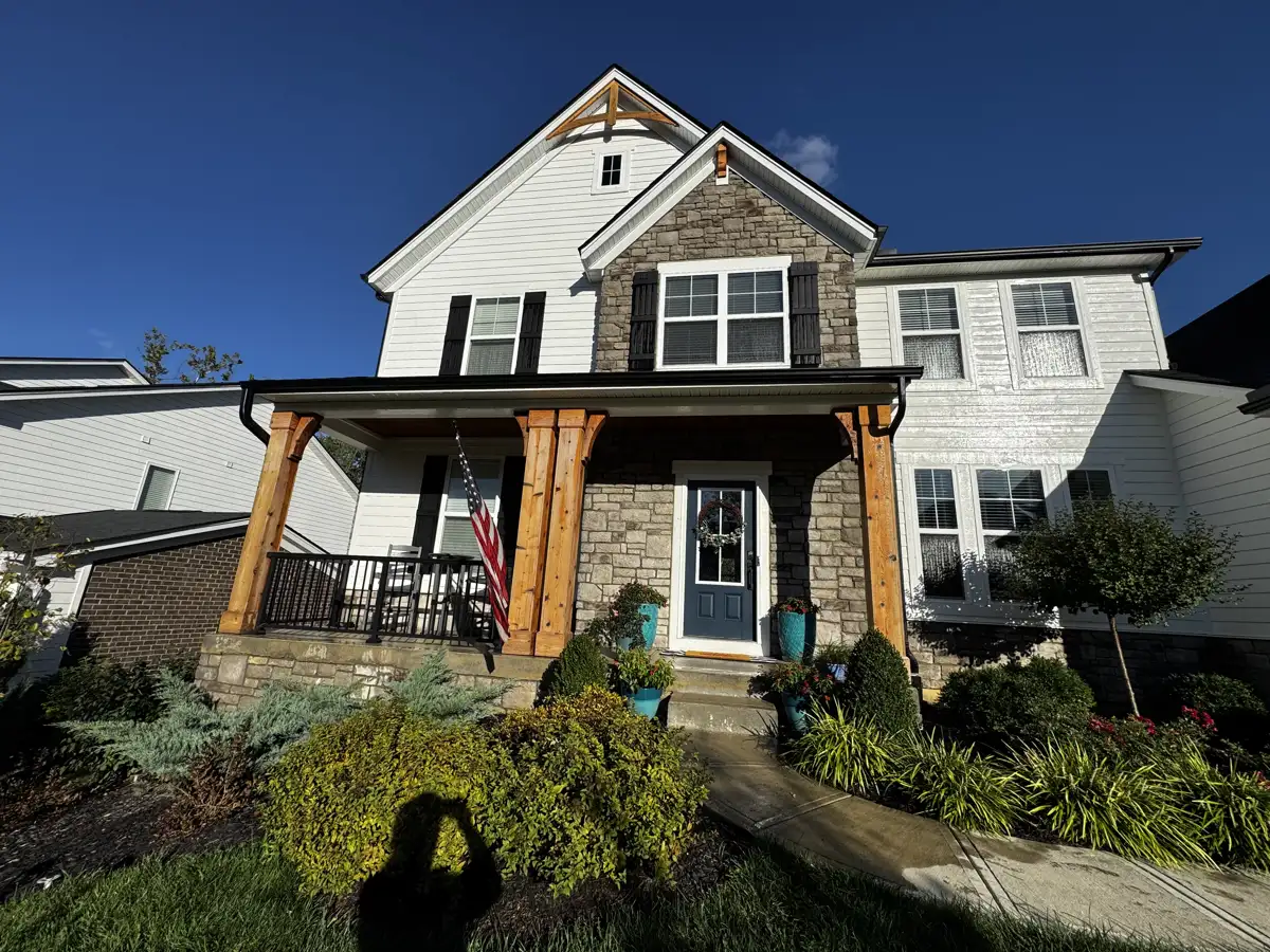 Craftsman home with stone & wood-column porch, cleaned