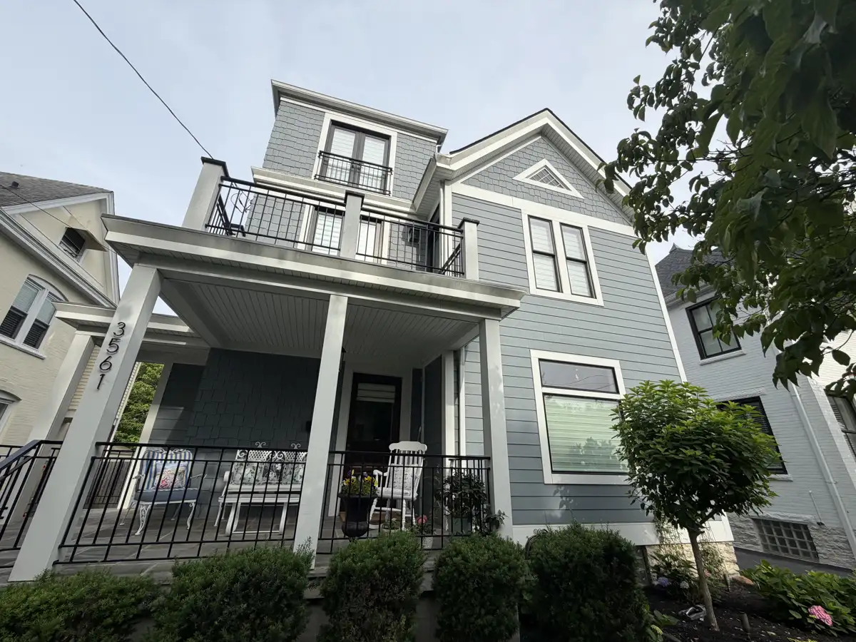 Clean gray Victorian home exterior